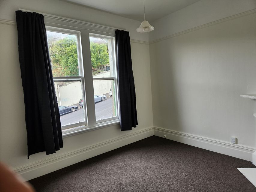 White bedroom with black trim